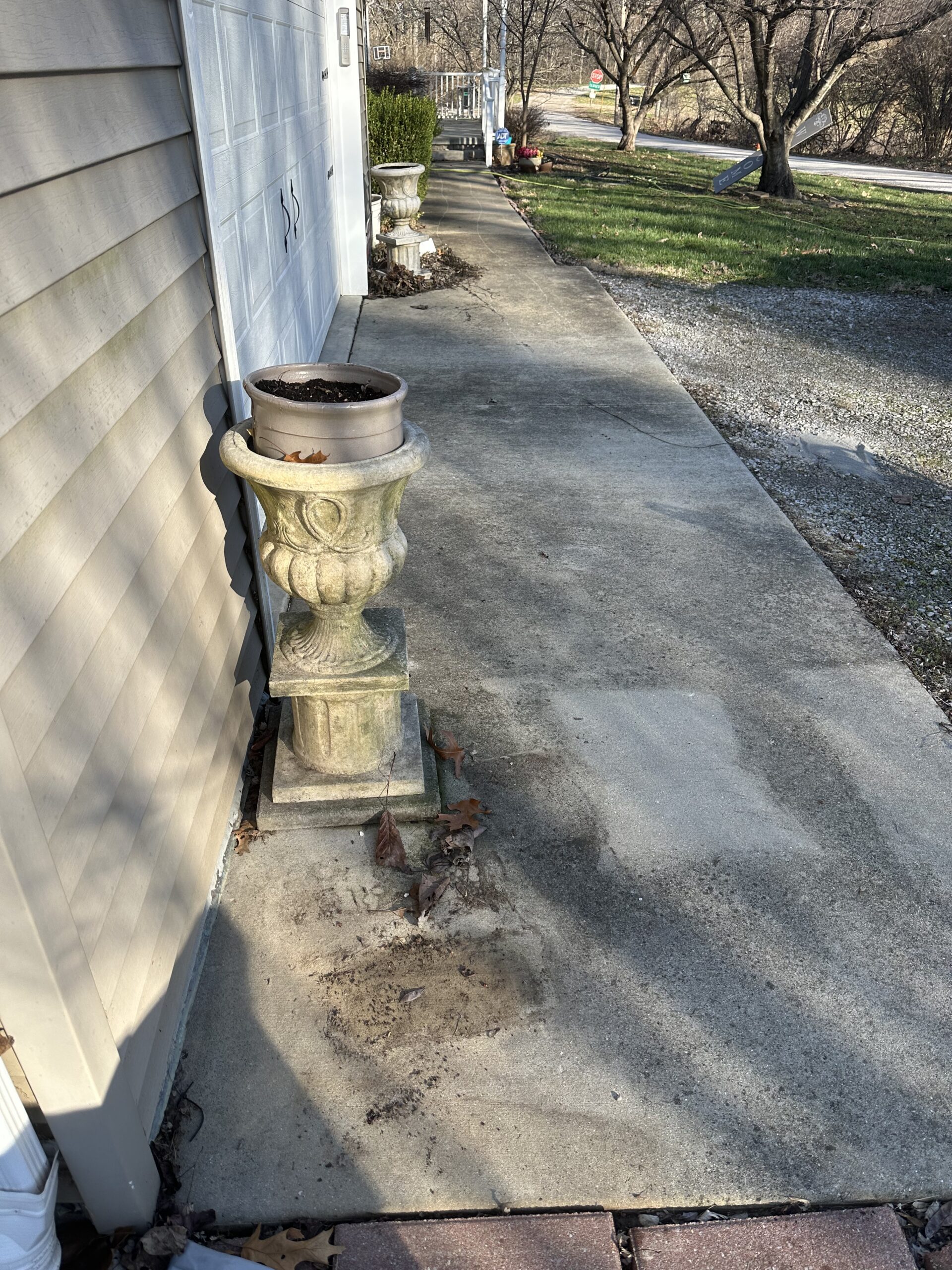 Concrete surface before professional concrete cleaning by Limitless Exterior Cleaning